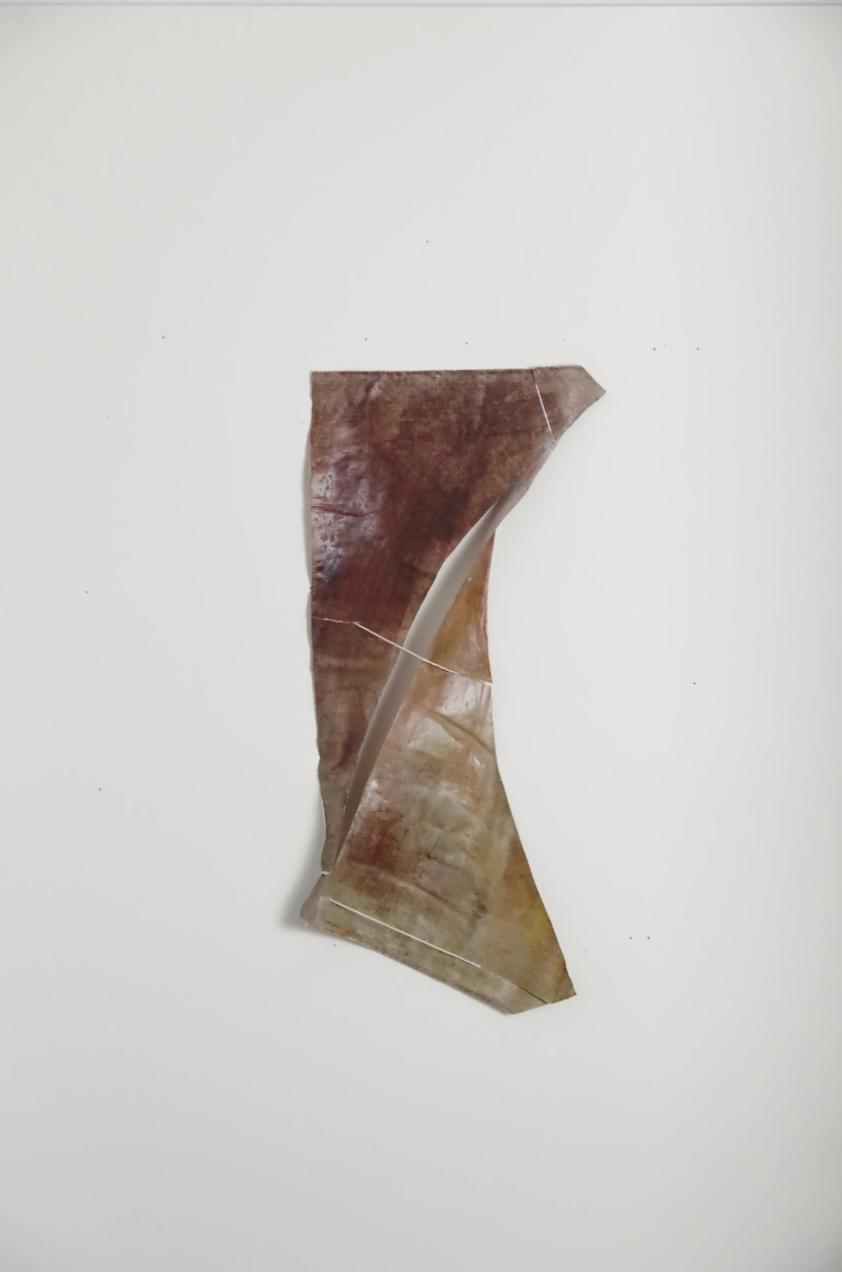a shape [12/34/2 cm] textile remnants stiffened with flour paste - colored with self-produced pigments - zoe bilgeri/ 2024/ weimar