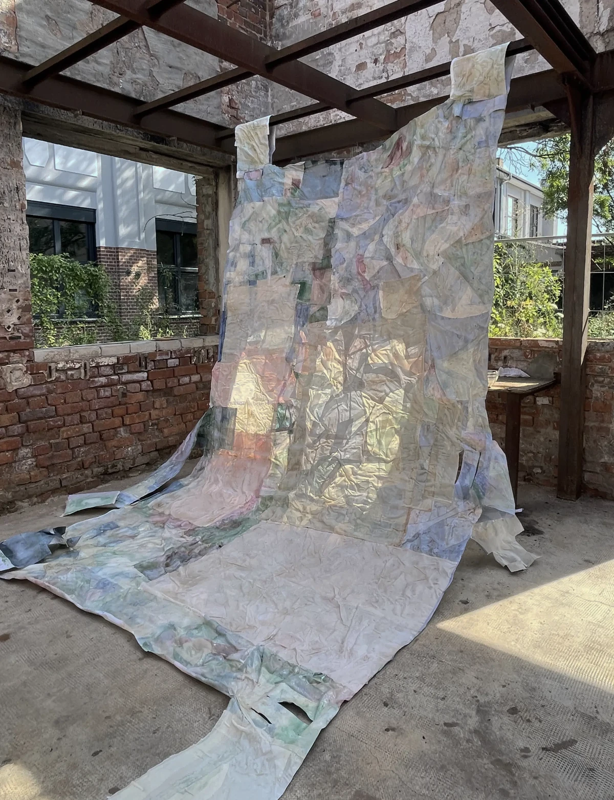 touch me [189/423 cm] textile waste glued and stiffened with bone glue - coloured with mineral pigments and coated with tung oil - zoe bilgeri/ 2024/ leipzig